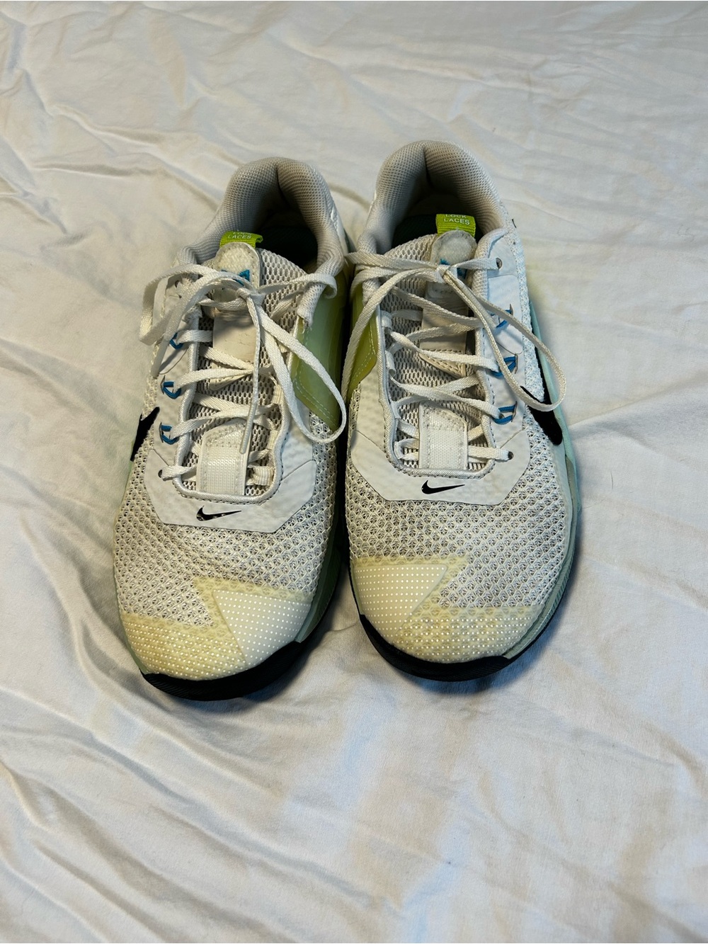 Nike women’s White and Light Green Running Shoes
